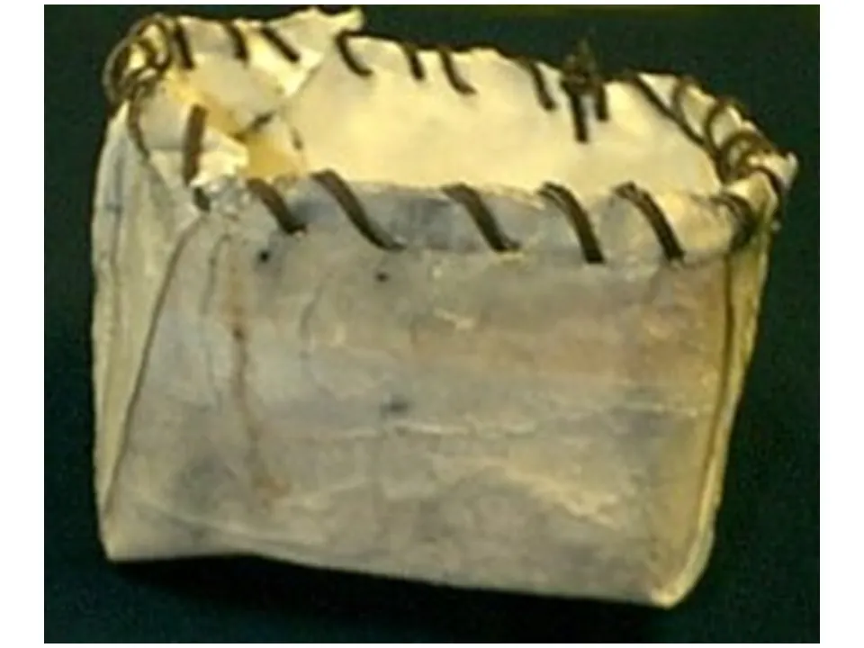 A student-made container imitating a birchbark basket, laced at the rim