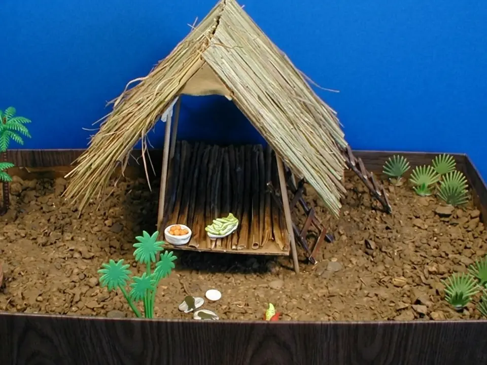 Student model of a chickee with a raised floor and thatched roof