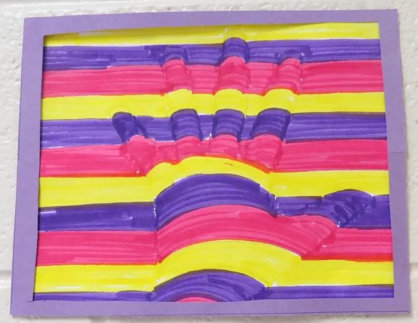 Student optical art hand illusion project