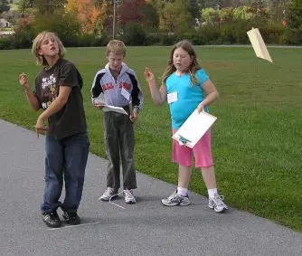 Paper airplane in flight