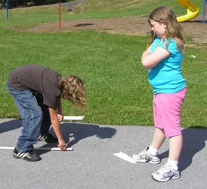 Students measuring airplane flight distance