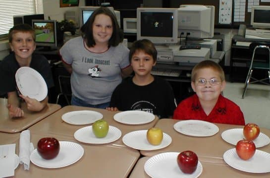 Students Comparing Apple Varieties